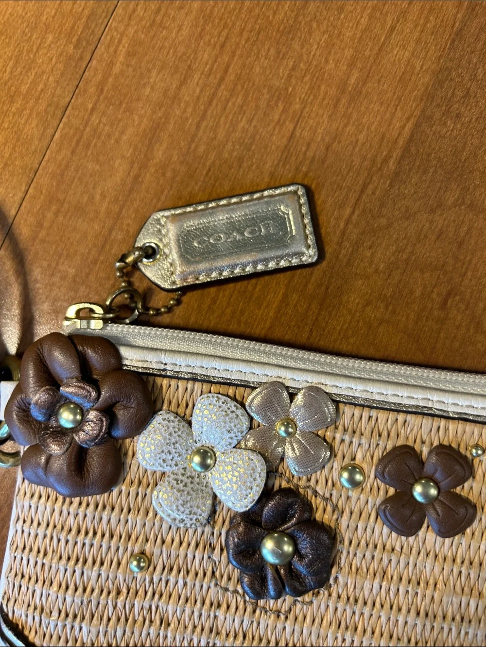 Coach Straw Wristlet with White Trim and Brown Floral Appliqués 2010